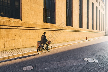 马路骑车阳光自行车骑行背景