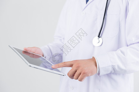 健康底图正在使用平板电脑的医生背景