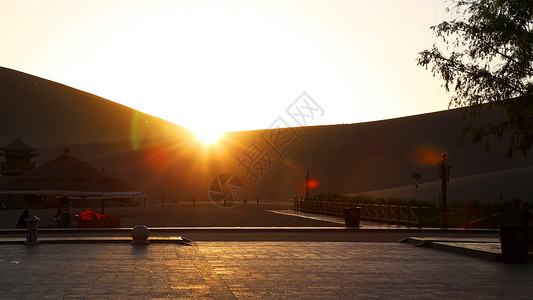 敦煌鸣沙山夕阳背景图片