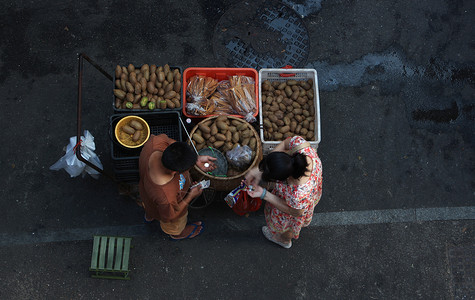 街边小贩上海城市街头水果摊背景