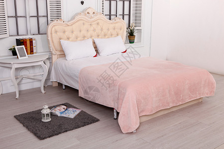 珊瑚绒毛毯卧室床和毛毯背景