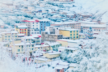 甘南雪郎木寺小镇雪景东风小瑞士背景