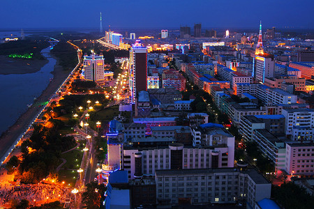 黑河旅游黑河城市夜景背景