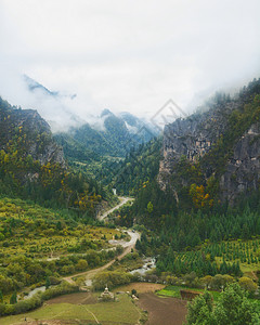 桃源仙境甘南扎尕那山脉沟壑风光背景