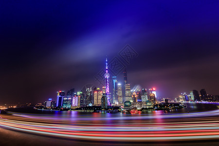 复杂的光轨迹绚烂璀璨的上海外滩夜景背景