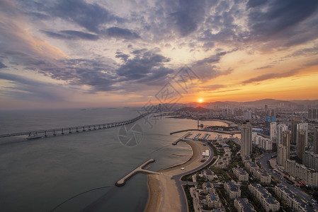 应星楼大连星海湾落日背景