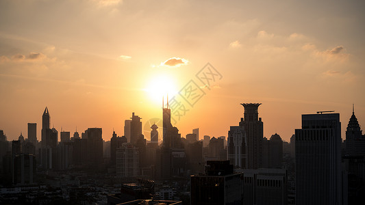 鲁迪格上海市地标建筑日落背景