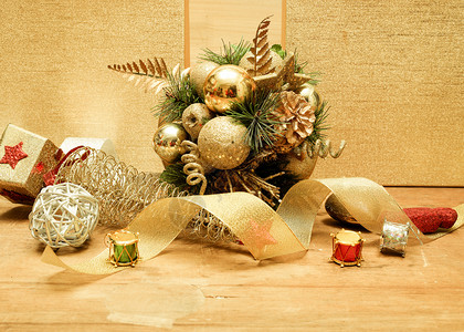 圣诞节金色丝带圣诞装饰铺满桌面背景