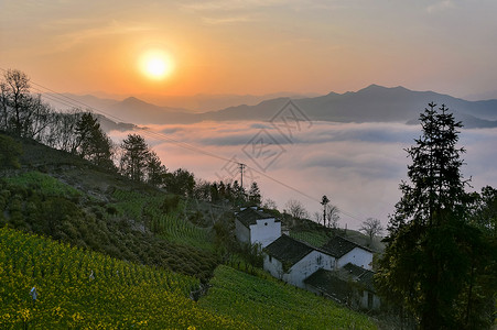 朦朦胧日出日出山居云海背景