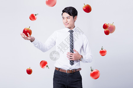 吃番茄的恐龙健康生活的商务男性设计图片