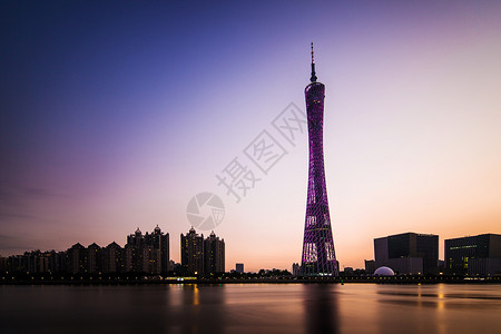 广州日出夜幕下的广州塔背景