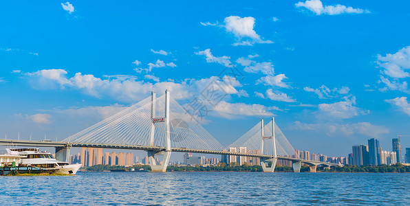 船只起航武汉长江大桥背景