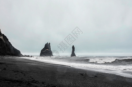 狂风大浪冰岛黑沙滩地标岩石背景