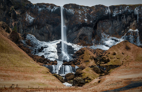 冰岛瀑布橙色岩石高清图片