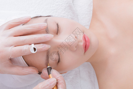 韩式纹眉美女顾客在做纹眉背景