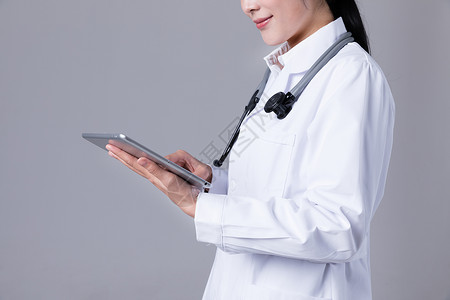 医疗平板年轻医生使用平板电脑背景