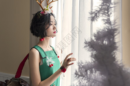 圣诞装束的美女背景图片