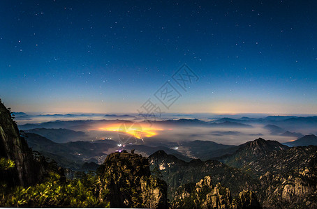 星空山峰黄山猴子观海背景