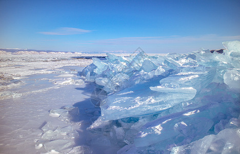背景图蓝素材冬季湖面上蓝色的冰块背景