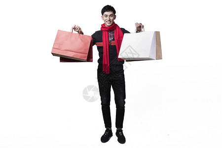 新年喜庆男士人像手持购物袋背景图片