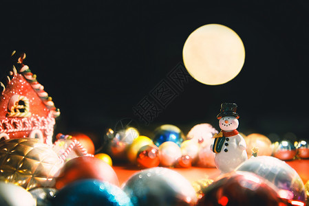 圣诞节背景月下的雪人背景图片