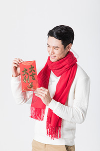 新年男性开心的拿着红包背景
