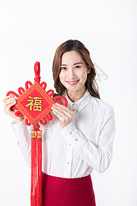 公司红包素材新年商务女性手拿中国结背景