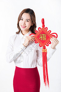 新年商务女性手拿中国结背景图片
