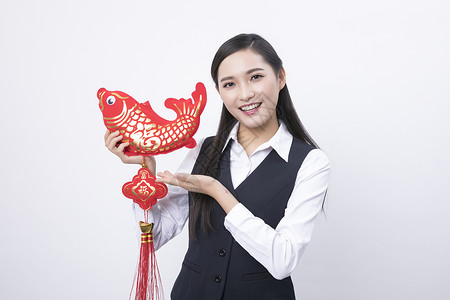 中国风商业免费素材手拿新年装饰的职业女性背景