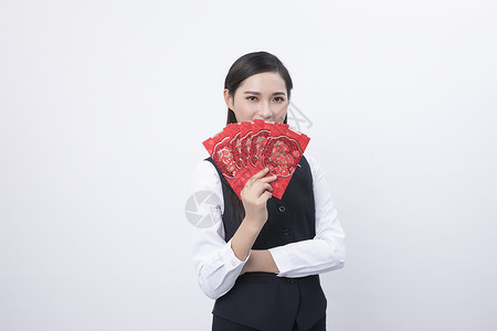 手拿红包的商务女性人像背景图片