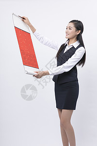 剪纸风装饰飞机手拿新年装饰的职业女性背景