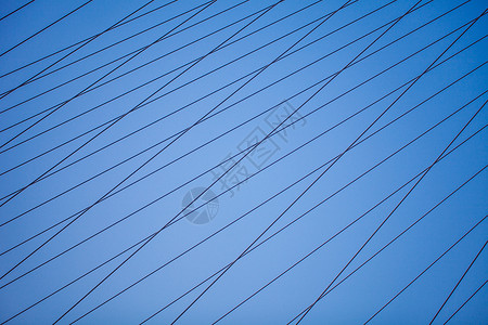 大桥铁拉线蓝天下的五线谱铁拉线背景