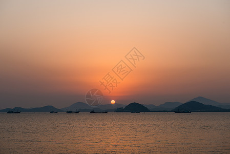 海边日出背景图片