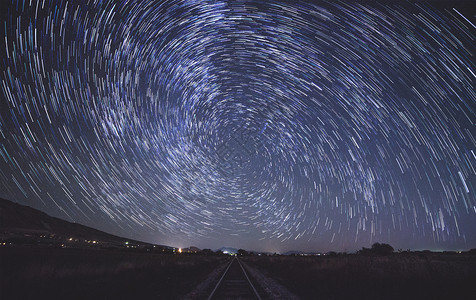铁路天空星轨背景高清图片