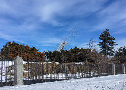 珀魁北克蒙特利尔的雪后奥林匹克体育场背景