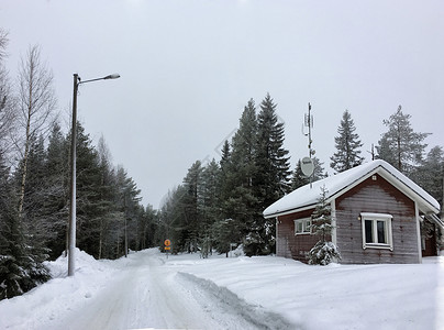白色小木屋芬兰罗瓦涅米森林小木屋背景