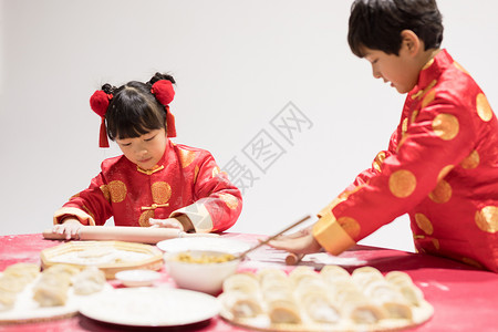 孩子学包饺子背景图片