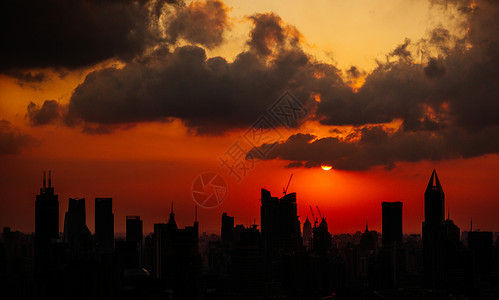 上海城市日落剪影背景图片