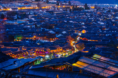 丽江玫瑰小镇丽江古城夜景背景