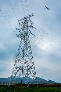 电力建设高压输电线的铁塔背景