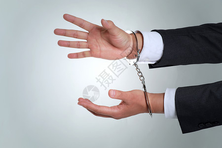 手带镣铐戴手铐的商人背景