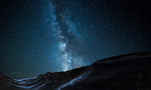 古城屋顶山峰星空背景设计图片