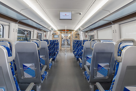 科技感列车蓝色空荡荡的动车列车座位背景