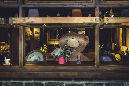 窗口的泰迪熊背景图片