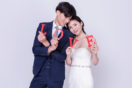 七夕快乐素材520情侣婚纱手持love字母背景