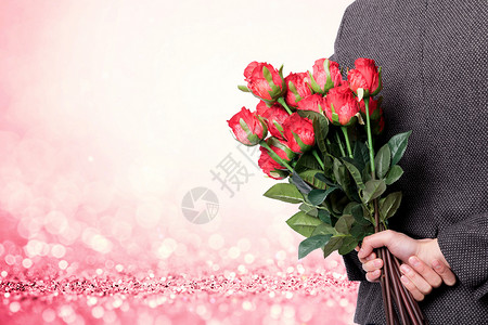 灰色情人节拿着玫瑰花的男性设计图片