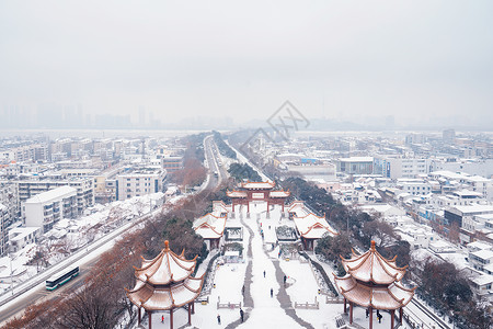 黄鹤楼下黄鹤楼上俯瞰武汉雪景背景