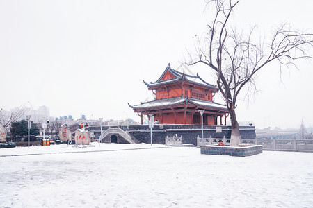 雪中的古城楼背景图片