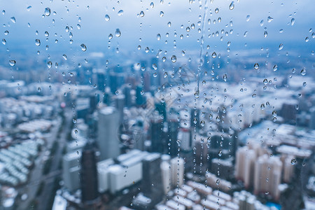 上海雨雪天气城市建筑全景背景图片