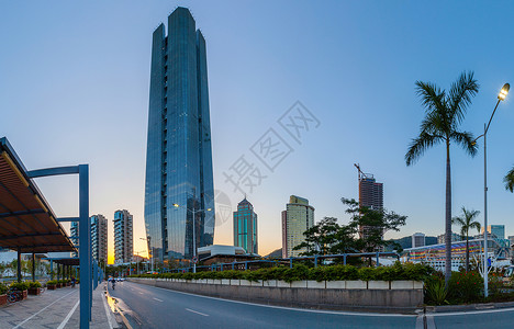 广场招商城市建筑与城市道路背景